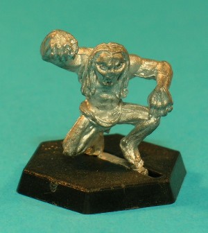 Pose 2, variant D. This variant has long, straggly hair hanging down the sides of his face and down his back. He looks downwards and to his front with his mouth open in a shout.