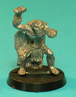 Pose 4, variant F. This variant has long straggly hair flowing down its back. It has a near-skeletal face with its mouth wide open barring its enormous set of teeth, and it looks straight forwards.